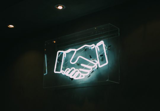 Succesful business deal handshake