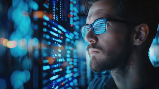 Programmer programming cybersecurity and IT
